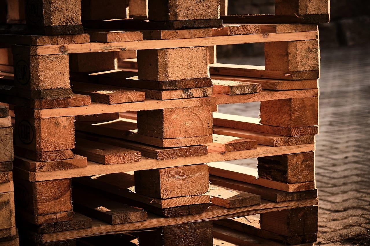 A stack of wooden pallets in warm side light