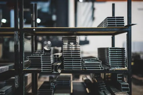 Metal profiles stored on steel racks