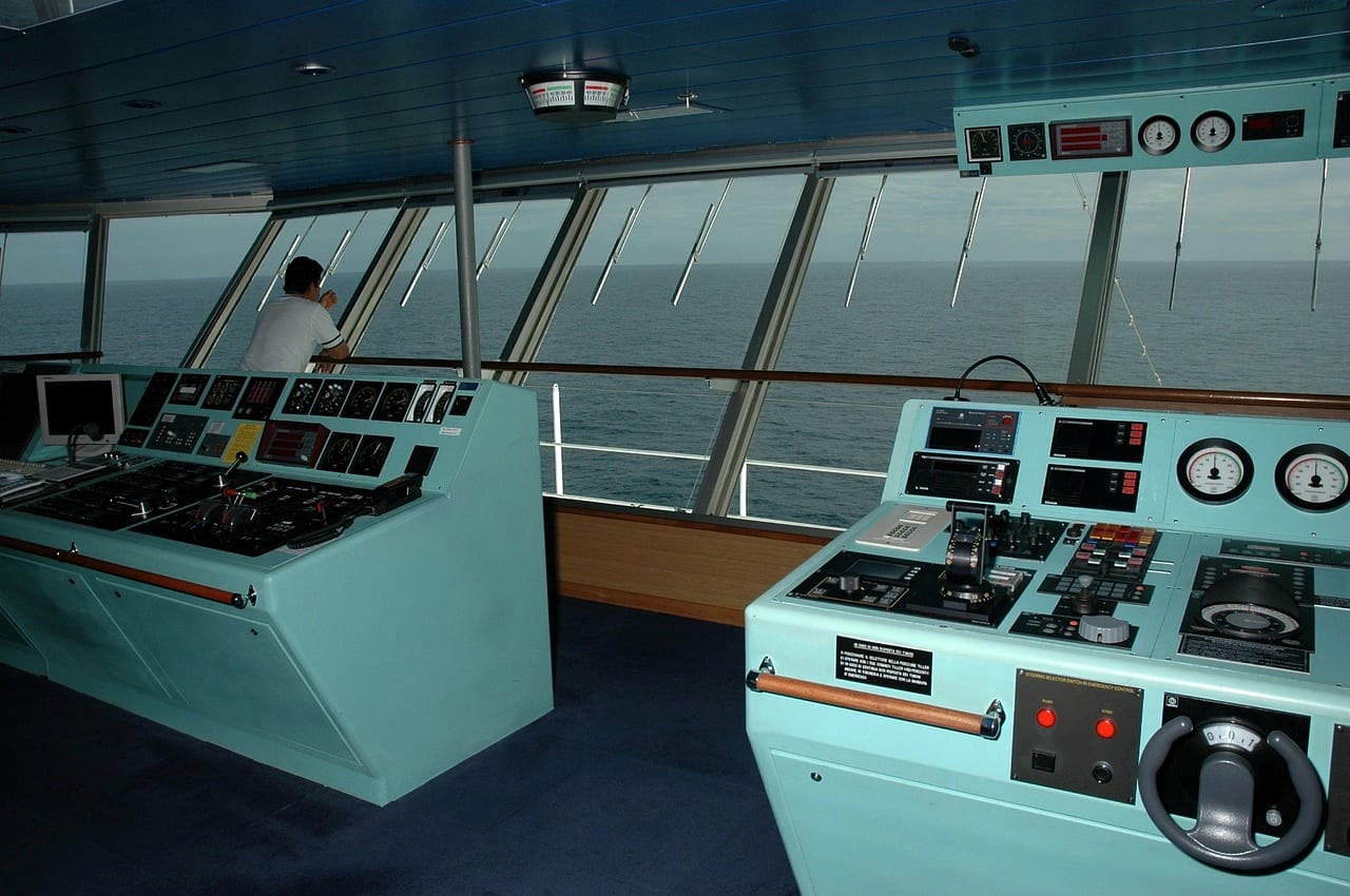 The control consoles on the bridge of a ship